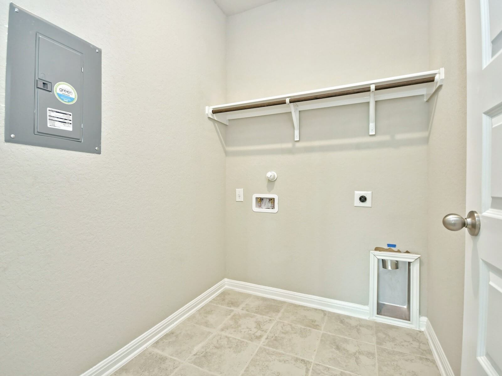 Laundry room in the San Saba floorplan at a Meritage Homes community.