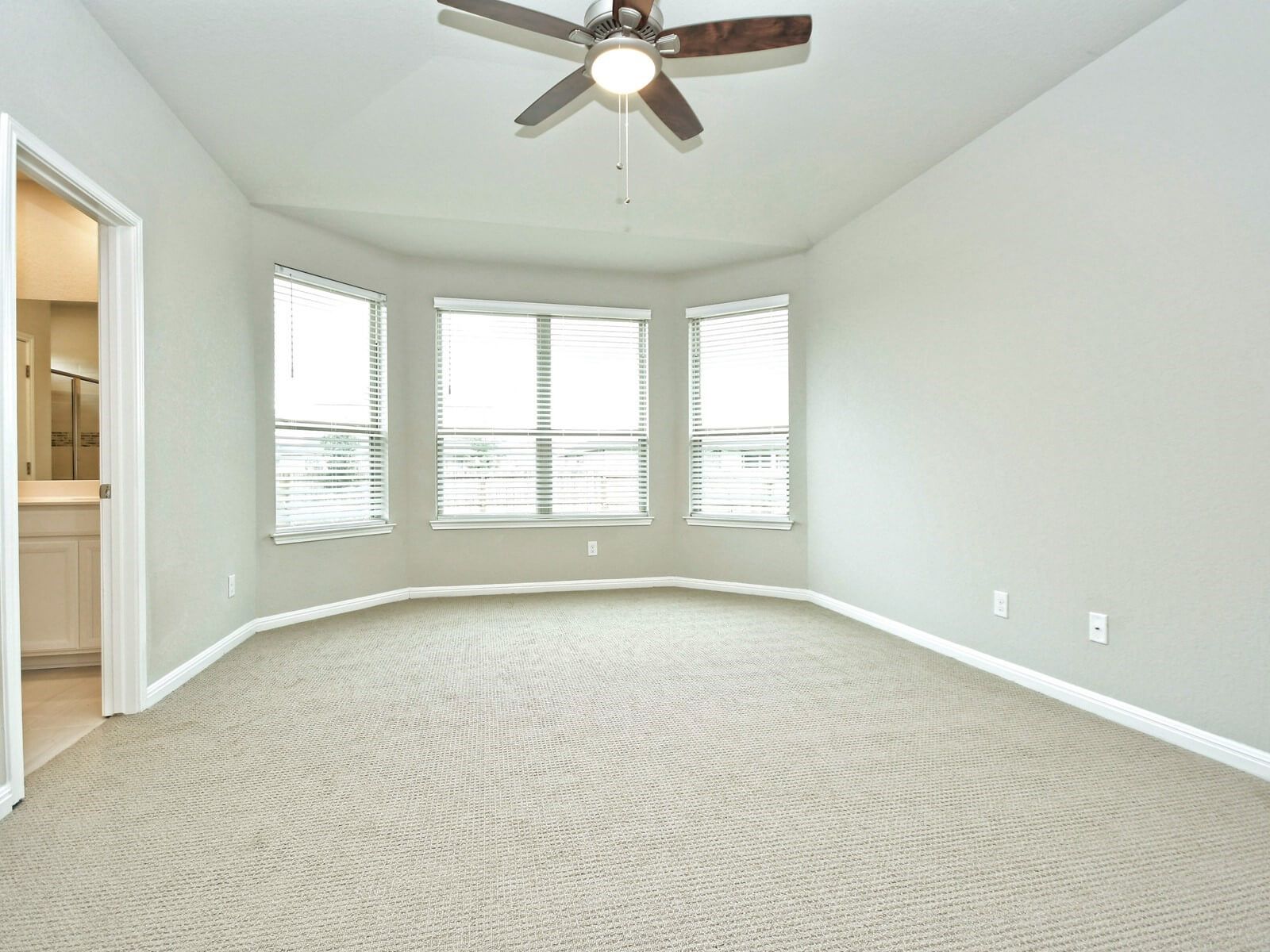 Primary suite in the San Saba floorplan at a Meritage Homes community.