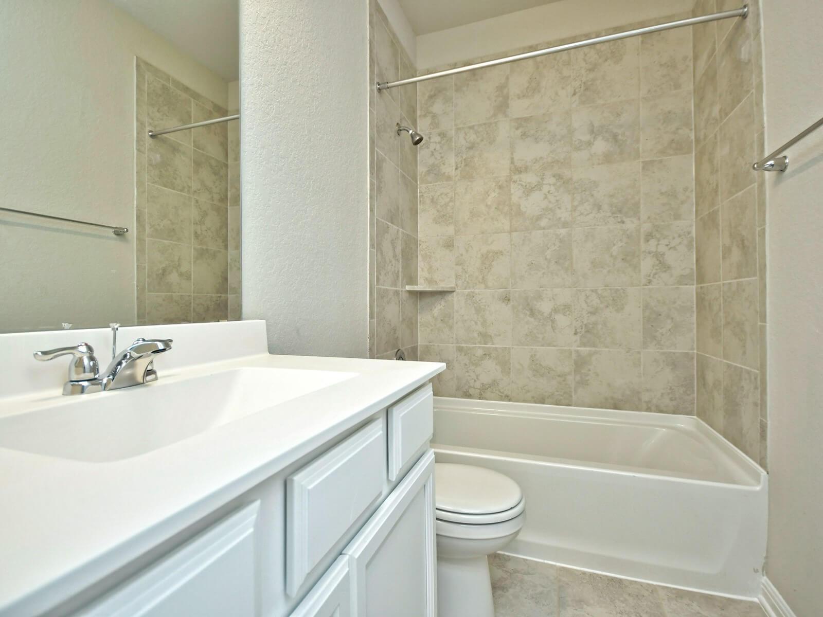 Guest bathroom in the San Saba floorplan at a Meritage Homes community.