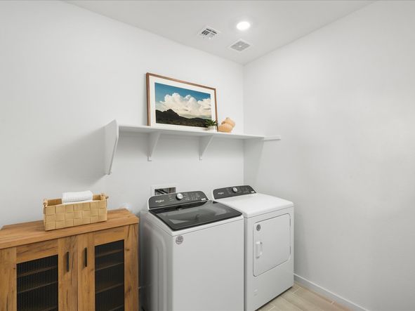 Laundry Room in Bailey Floorplan modeled at El Cidro