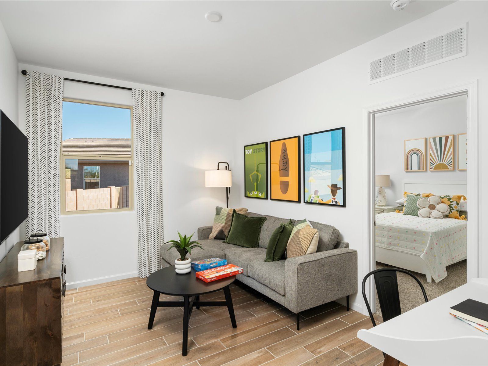 The flex space adjoining bedrooms 2 and 3 is a perfect place to work on homework or watch a movie.