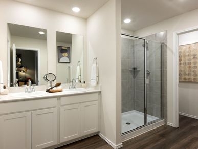 Live in luxury in the primary bathroom.
