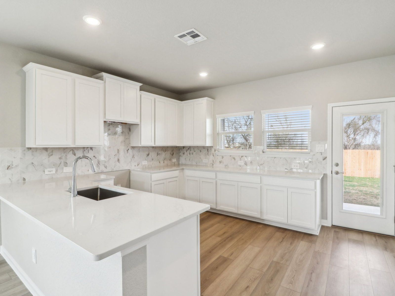 Kitchen in the Medina floorplan at a Meritage Homes community.