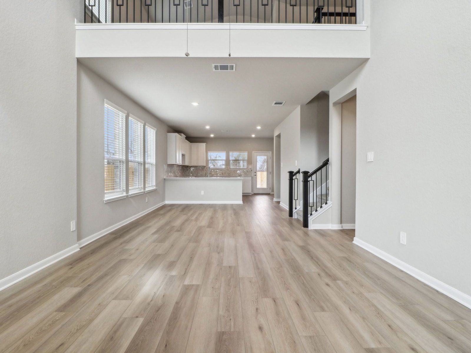 Living room in the Medina floorplan at a Meritage Homes community.