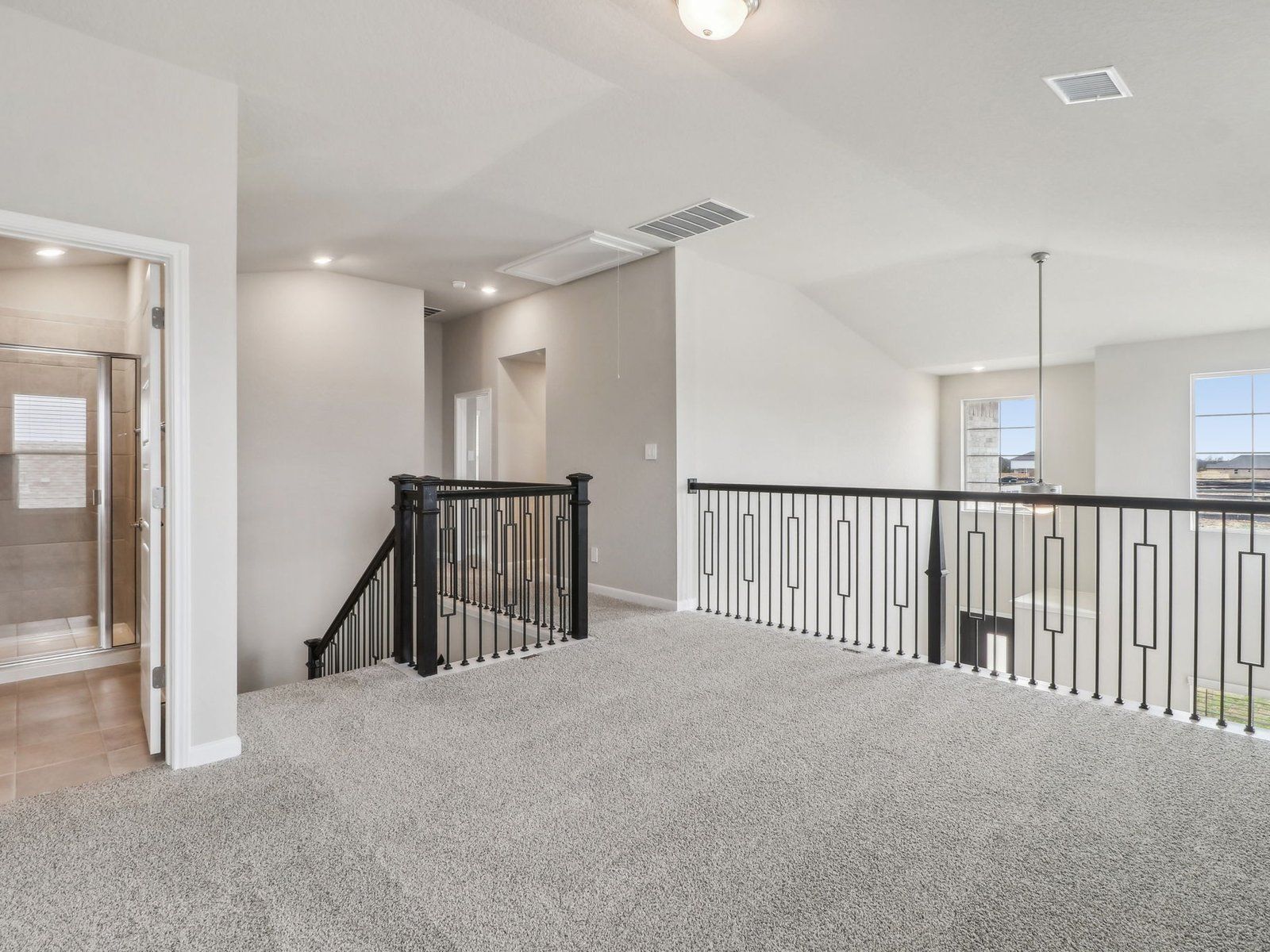 Second floor landing in the Medina floorplan at a Meritage Homes community.