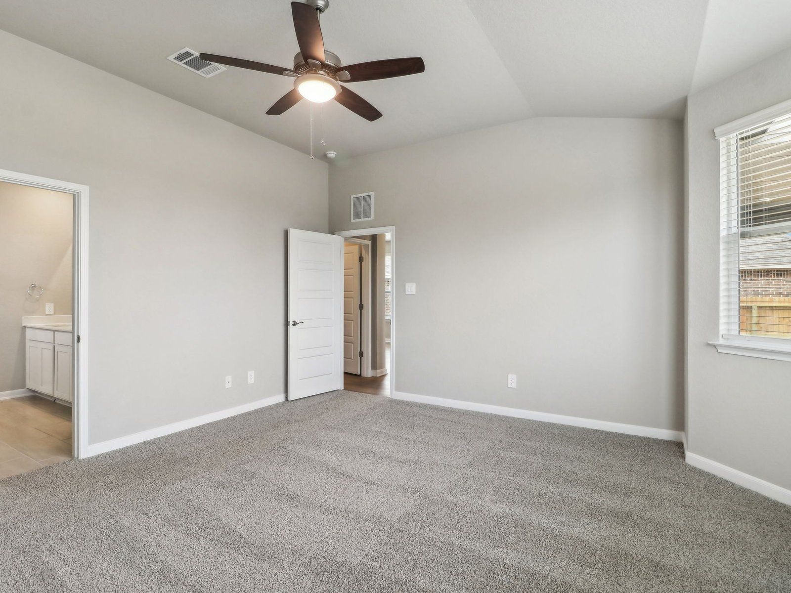 Primary suite in the Medina floorplan at a Meritage Homes community.