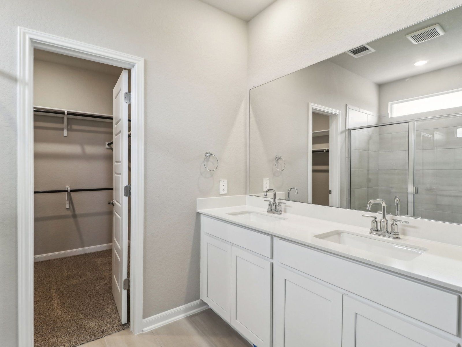 Primary suite bathroom in the Medina floorplan at a Meritage Homes community.