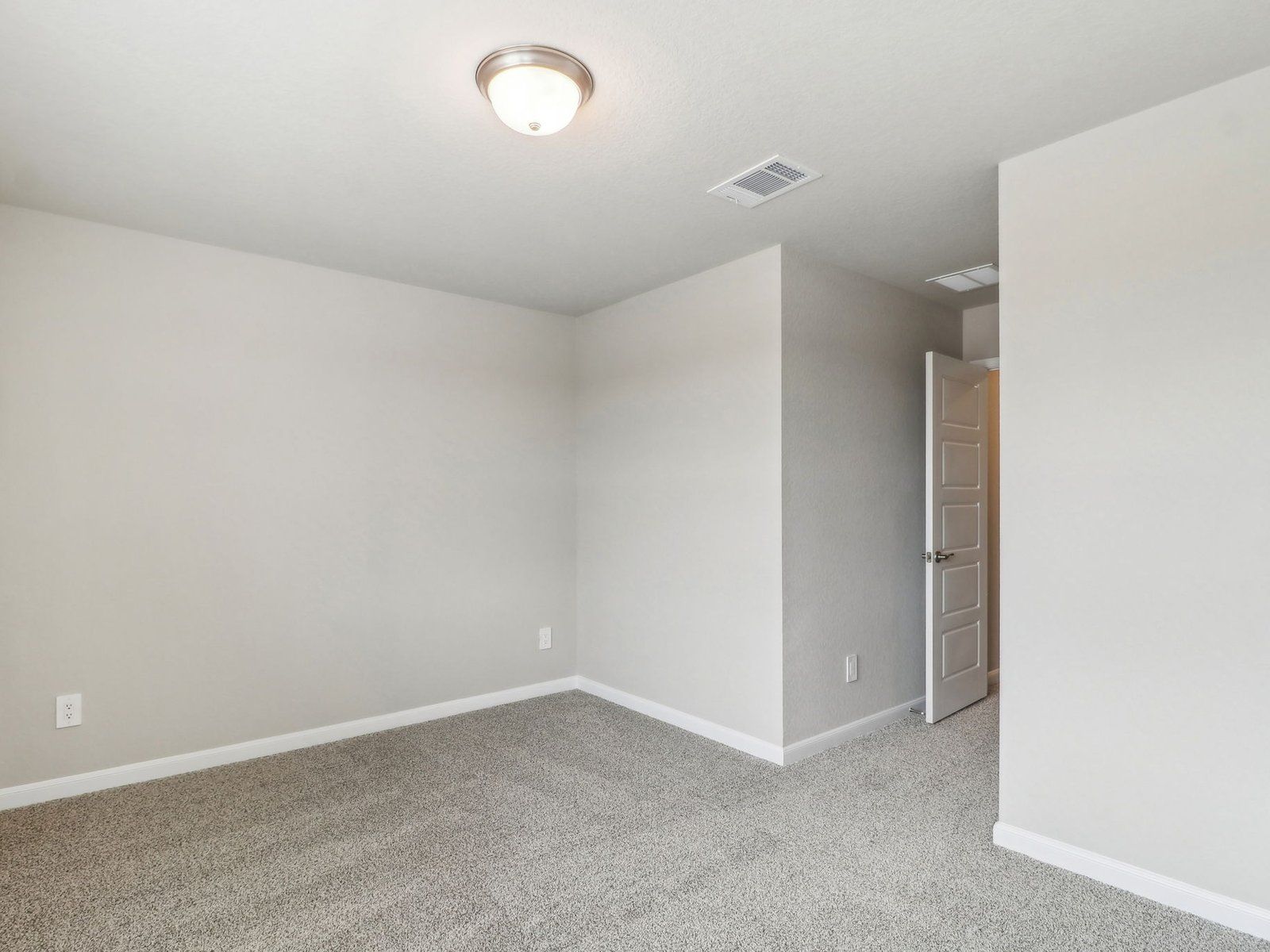 Guest bedroom in the Medina floorplan at a Meritage Homes community.