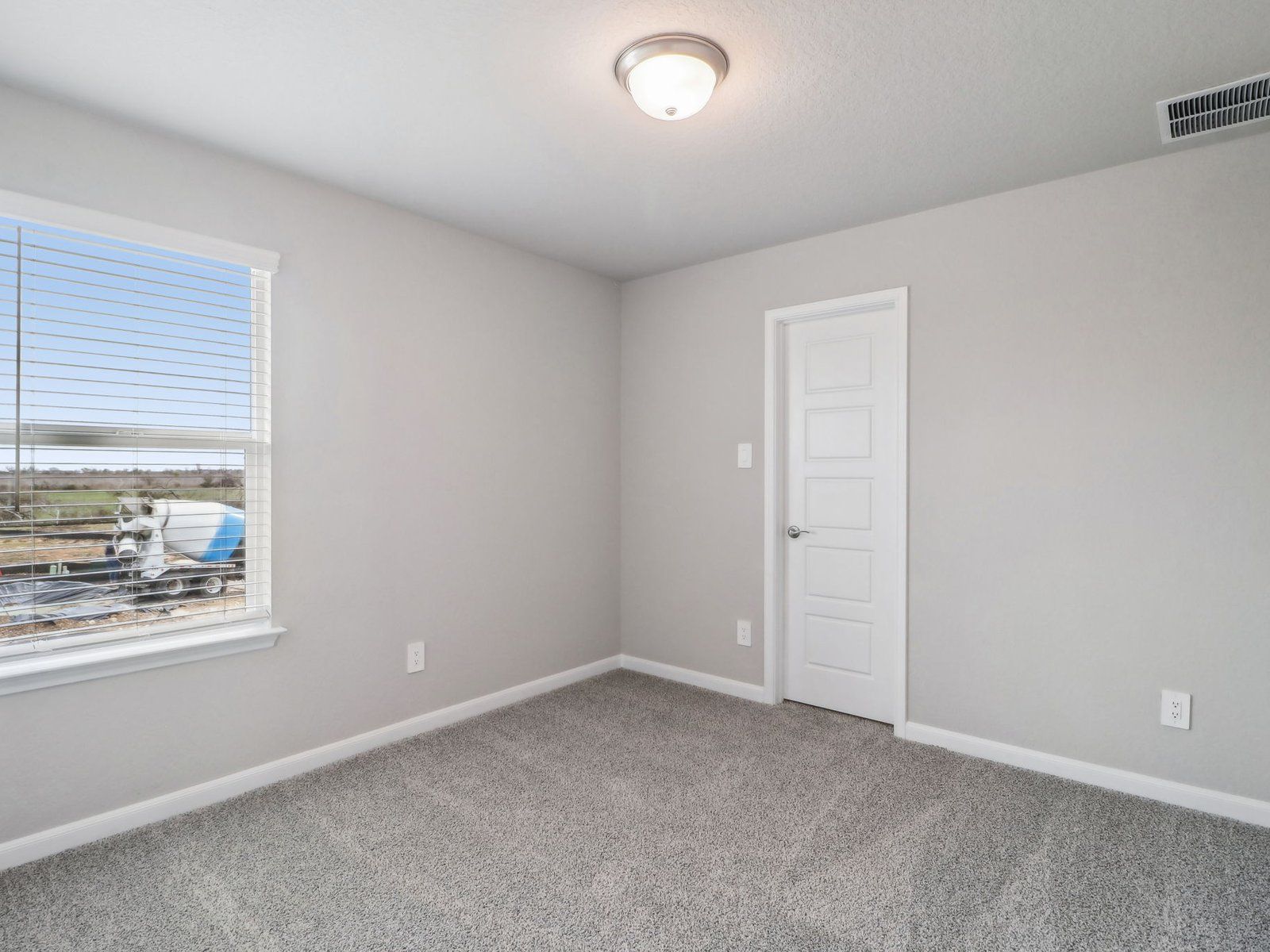 Guest bedroom in the Medina floorplan at a Meritage Homes community.