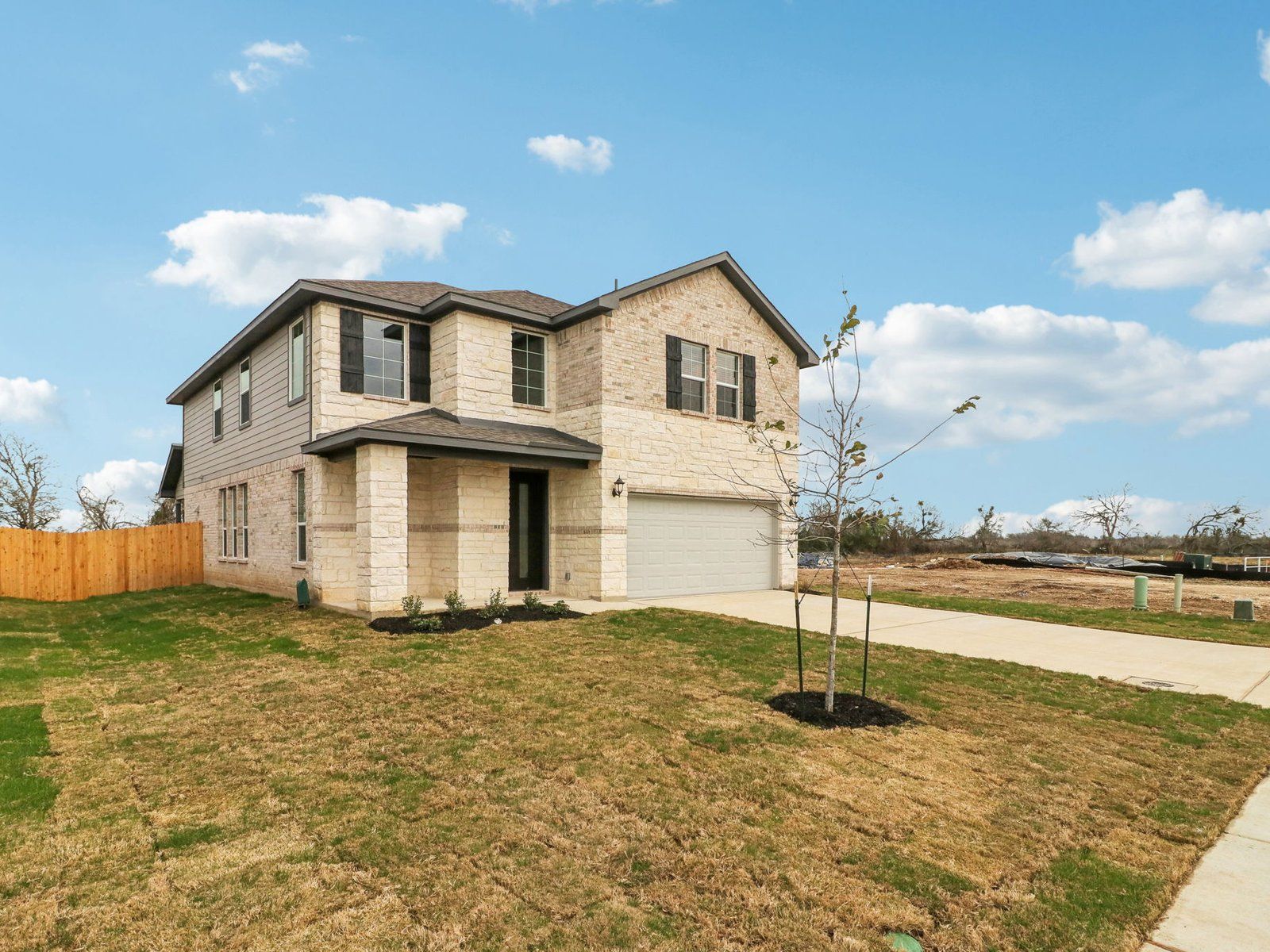 Front exterior of the Medina floorplan at a Meritage Homes community.