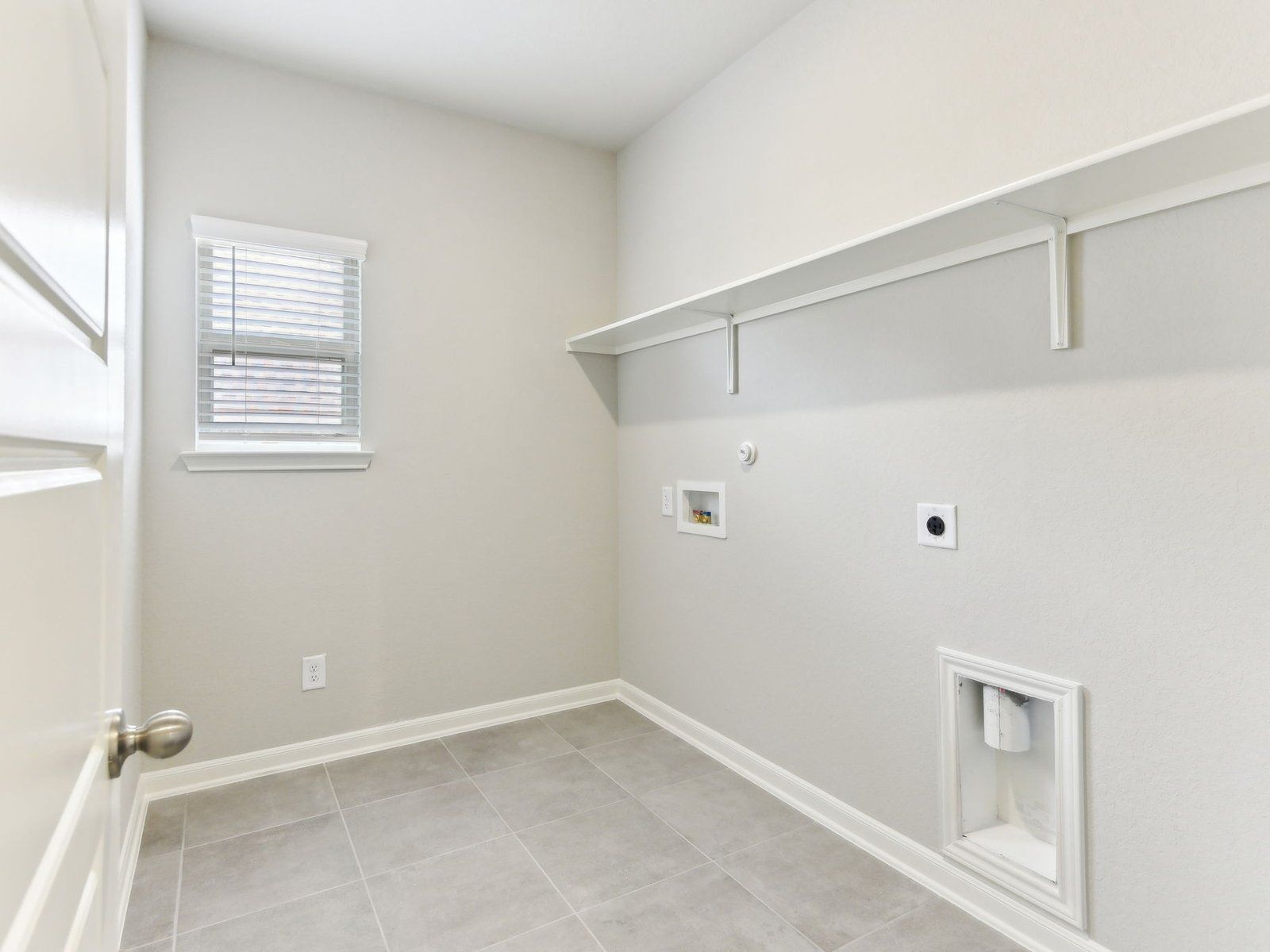 Laundry room in the Matador floorplan at a Meritage Homes community in San Antonio, TX.