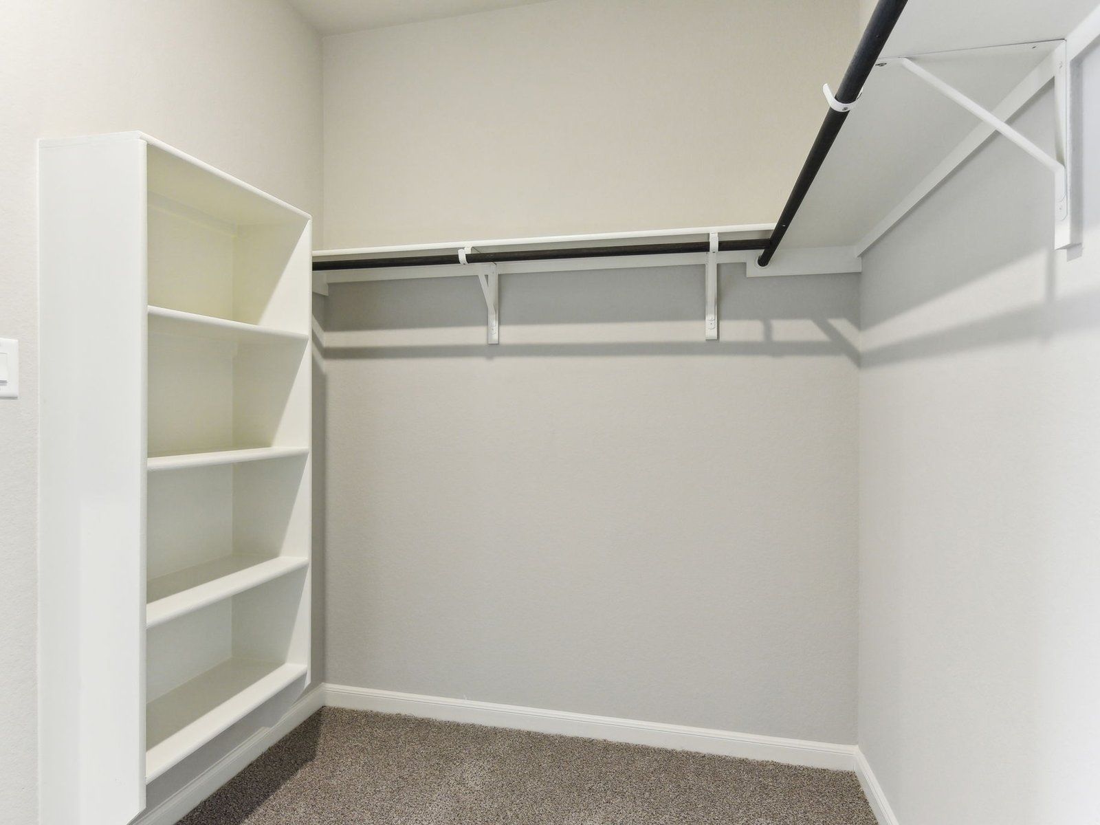 Primary suite walk-in closet in the Matador plan at a Meritage Homes community in San Antonio, TX.