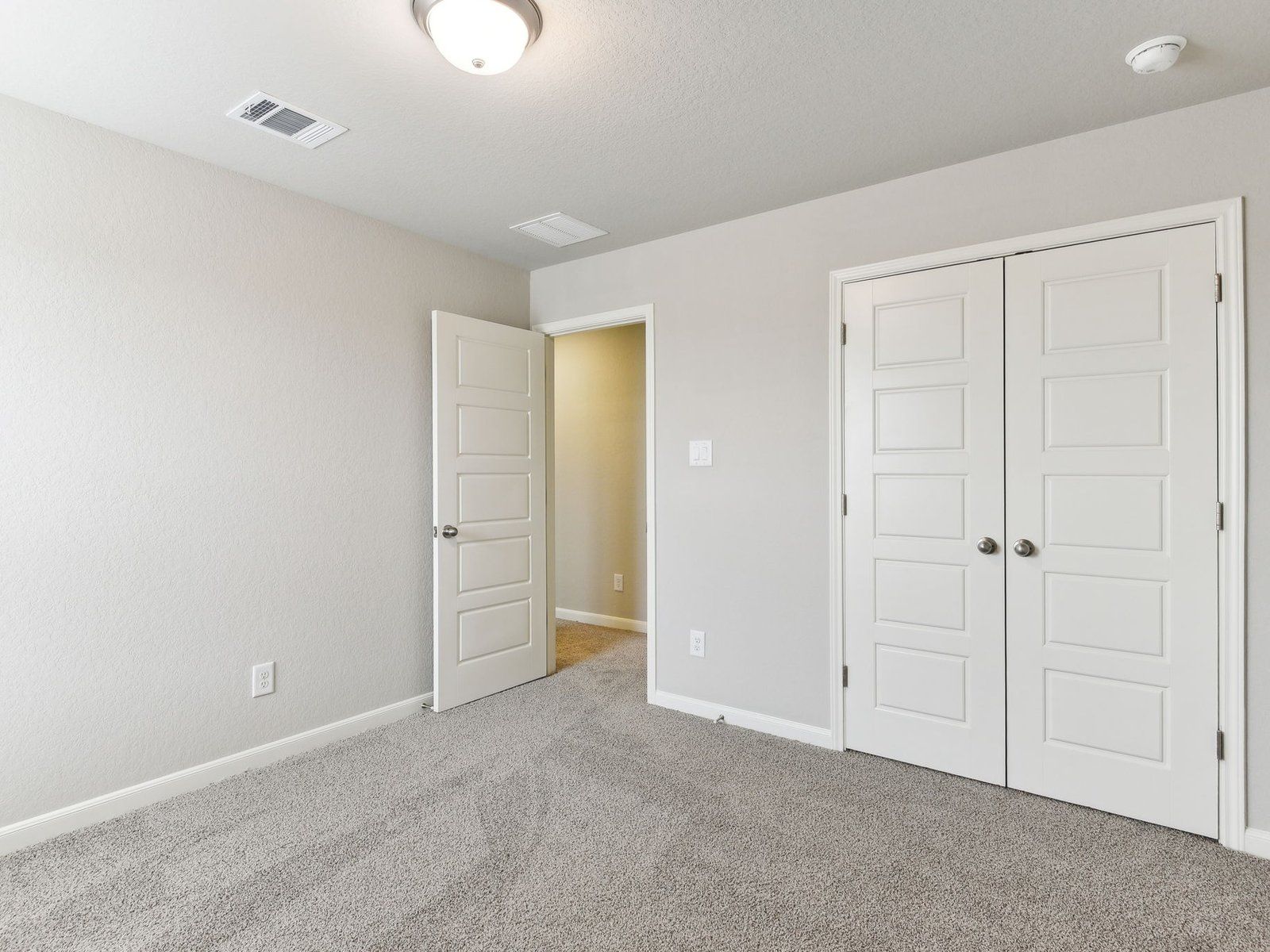 Guest bedroom in the Matador floorplan at a Meritage Homes community in San Antonio, TX.