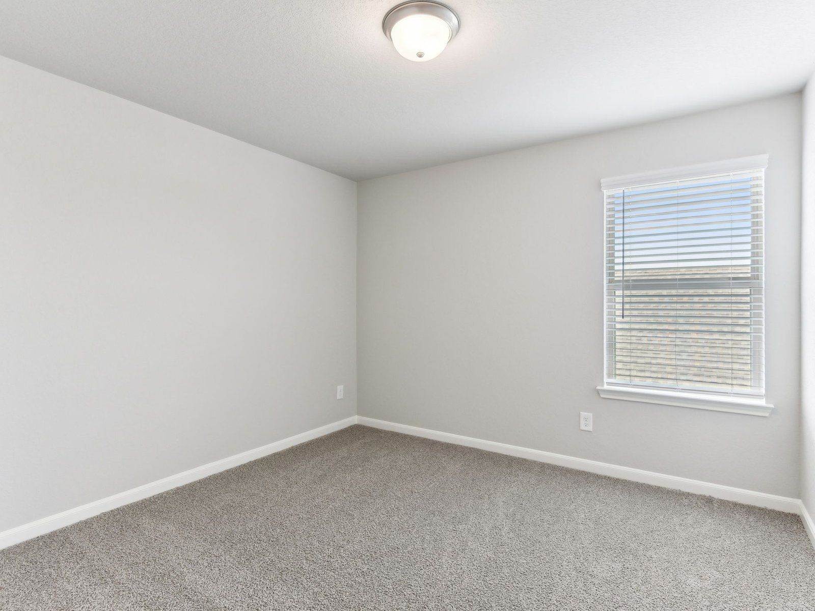 Guest bedroom in the Matador floorplan at a Meritage Homes community in San Antonio, TX.