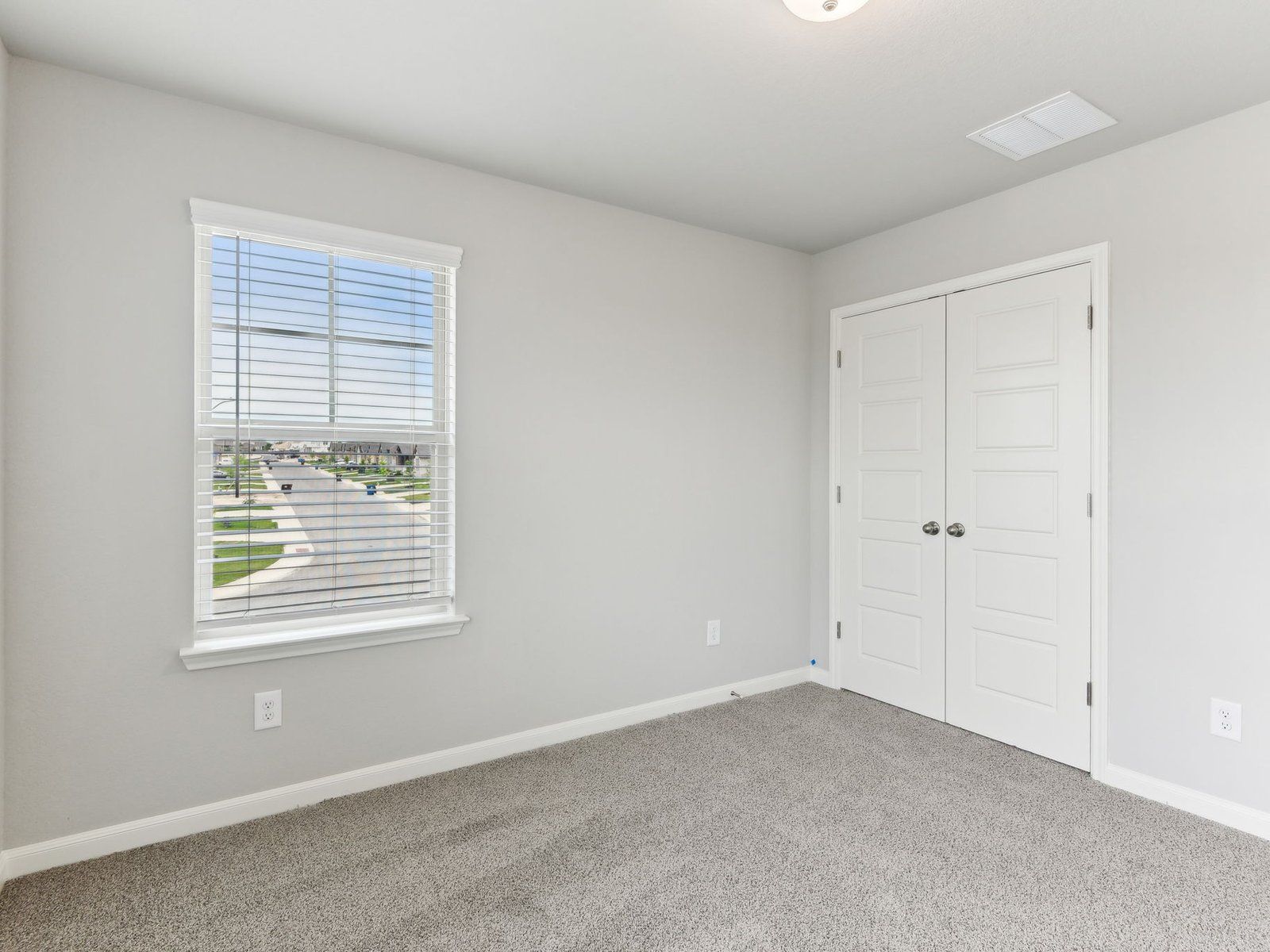 Guest bedroom in the Matador floorplan at a Meritage Homes community in San Antonio, TX.