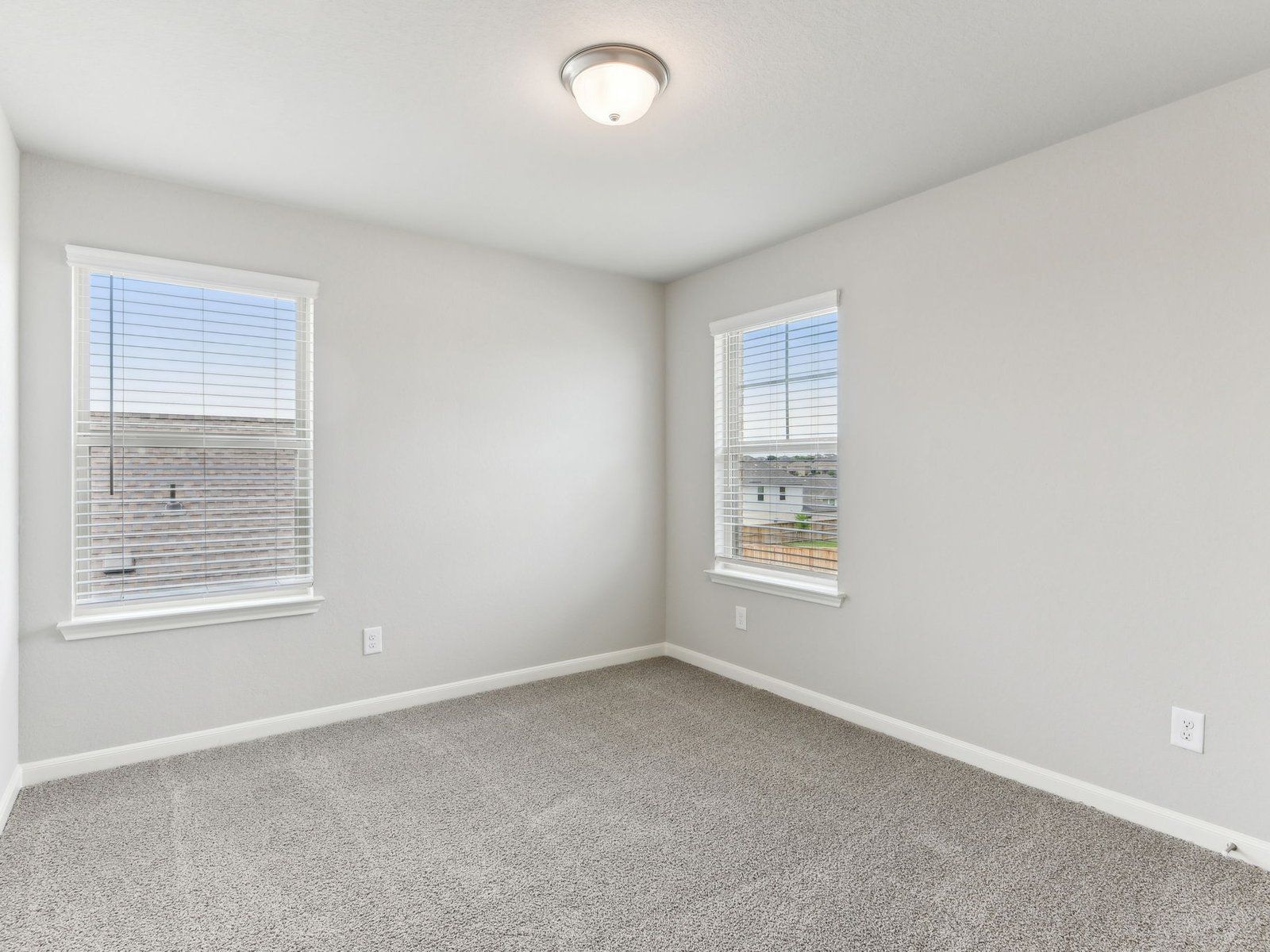Guest bedroom in the Matador floorplan at a Meritage community in San Antonio, TX.