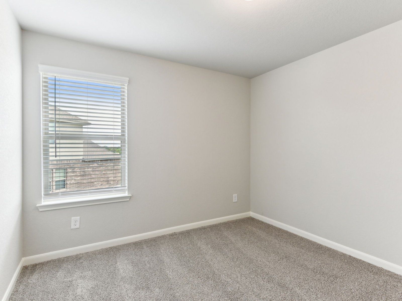 Guest bedroom in the Matador floorplan at a Meritage Homes community in San Antonio, TX.