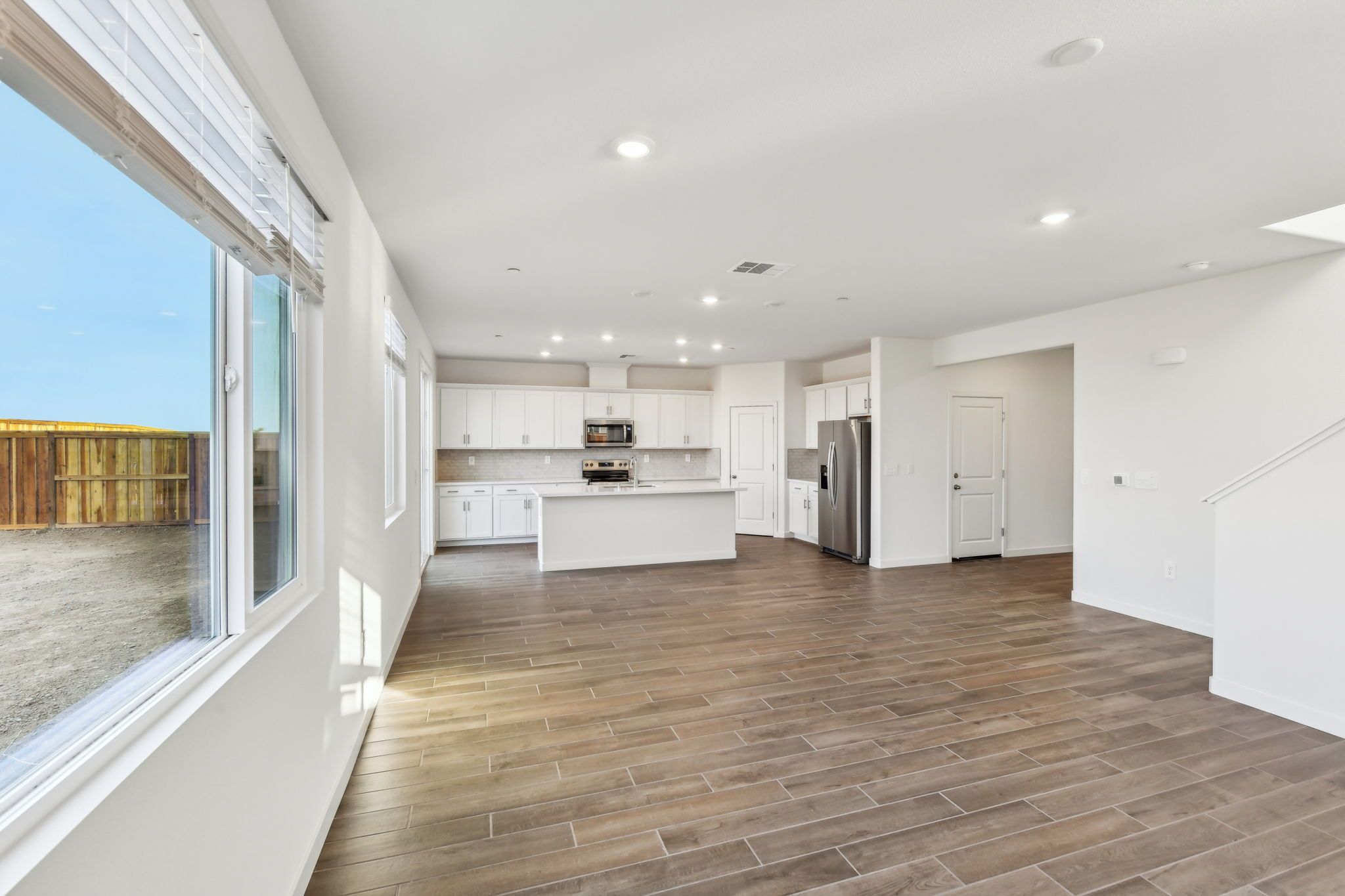 Residence 2 living and dining room shown at a nearby Meritage Homes Community.