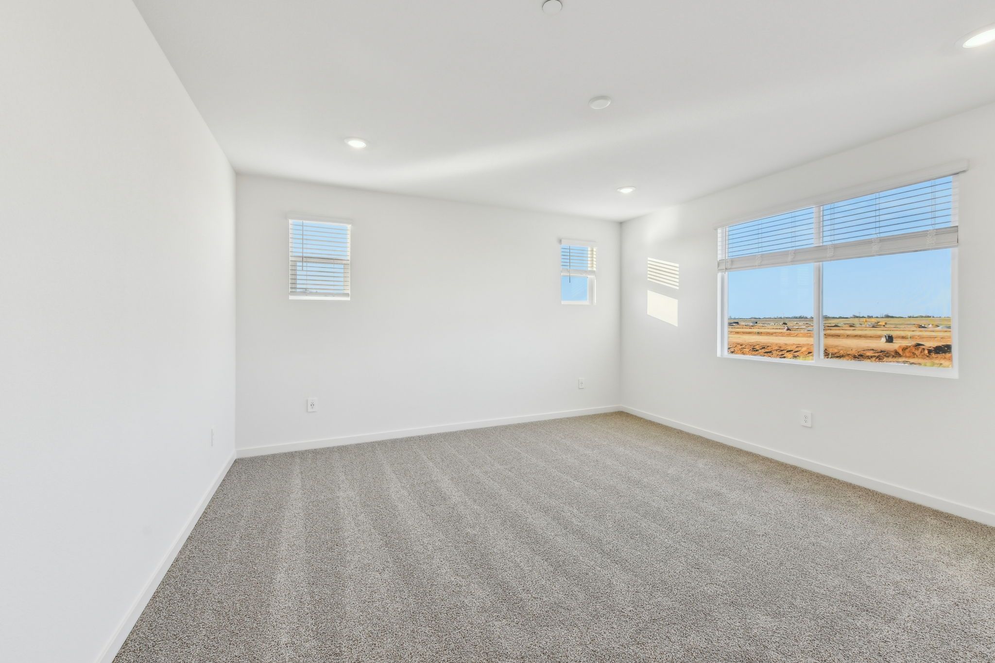 Residence 2 Primary Suite shown at a nearby Meritage Homes Community.