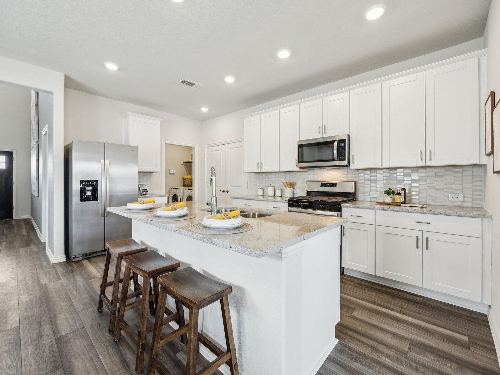 Enjoy an open concept kitchen in the Olympic floorplan.