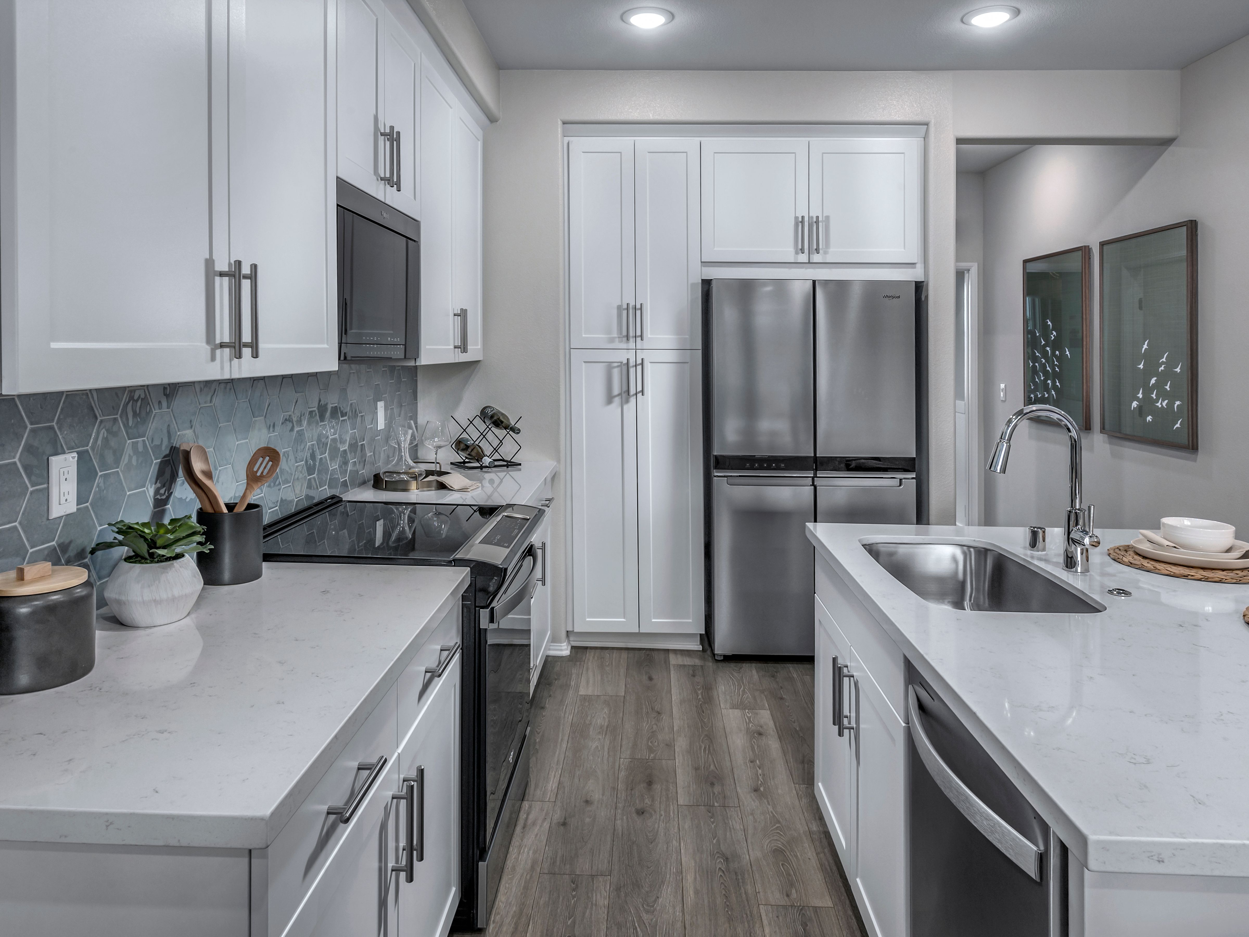 Kitchen in the Residence 2 floorplan at Cielo by Meritage Homes in San Marcos, CA.