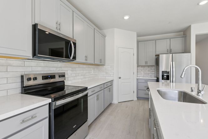 Kitchen of a Residence 4, built at a nearby Meritage Homes Community.