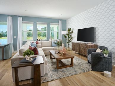 Living room in the Modena floorplan modeled at Ridgehaven