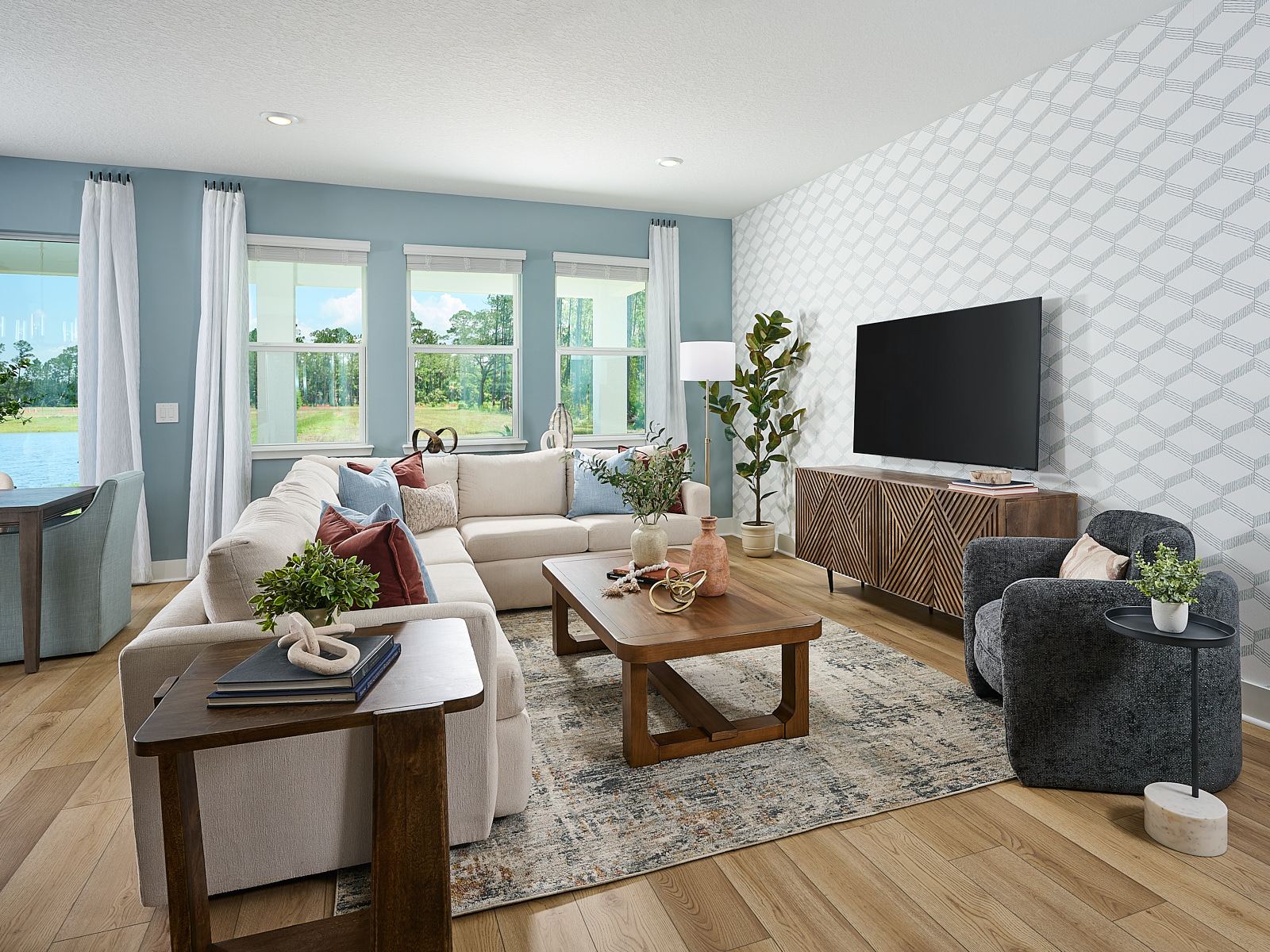 Living room in the Modena floorplan modeled at Ridgehaven