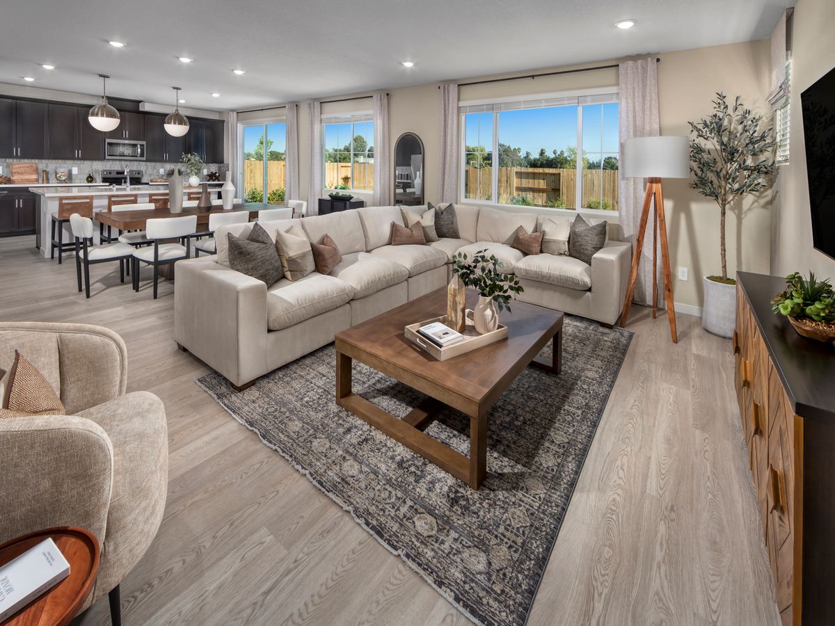 Open-Concept Living, Dining, and Kitchen of the Residence 4.