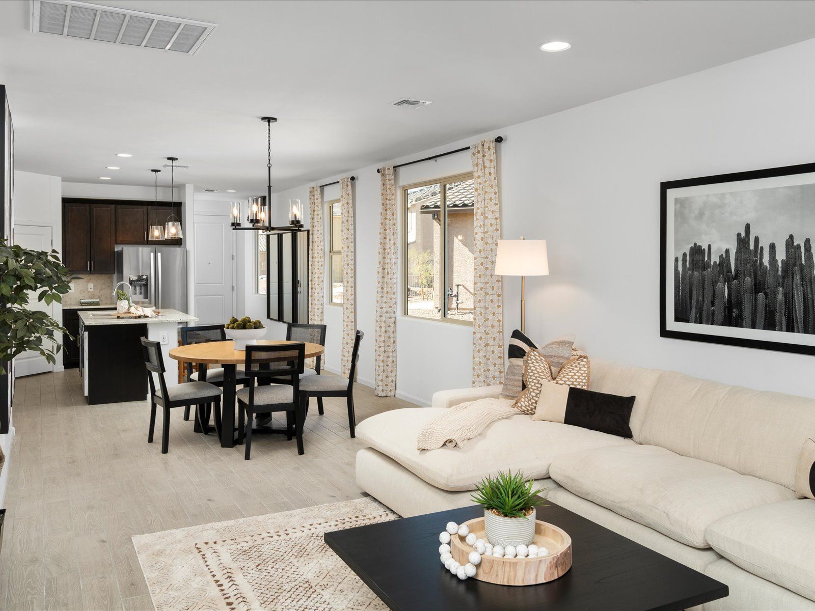 Welcome to the 1460 plan modeled at Las Patrias at Star Valley in Tucson, AZ.