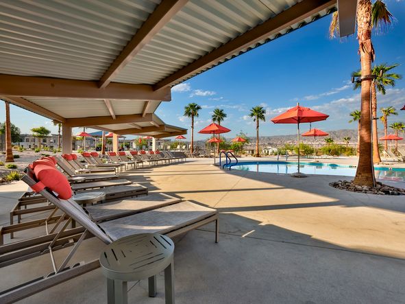 Relaxation comes easy in this serene poolside setting.