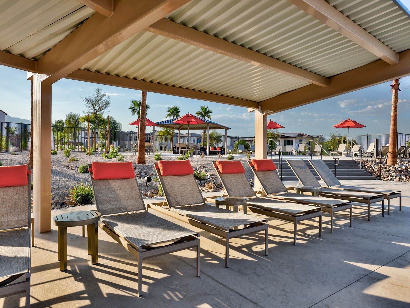 Soak in the sun from stylish poolside loungers.