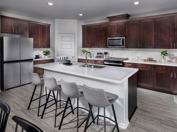 Spacious, chef-inspired kitchens fully equipped with a suite of Whirlpool® appliances.