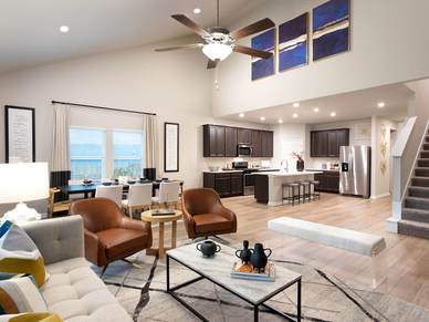 The open concept kitchen, living, and dining areas are great for entertaining.