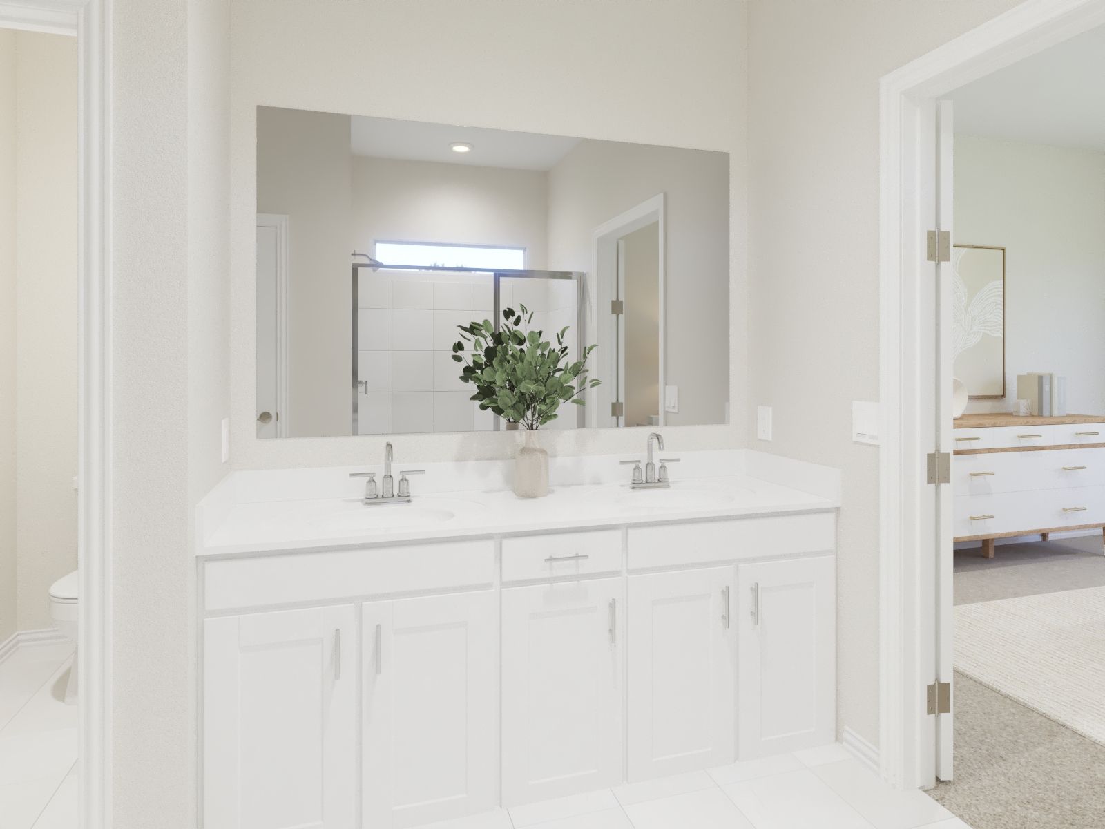 Primary bathroom with double vanity and large walk-in closet