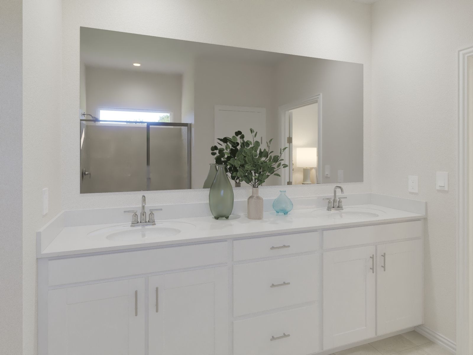 Primary bathroom with double vanity and large walk-in closet