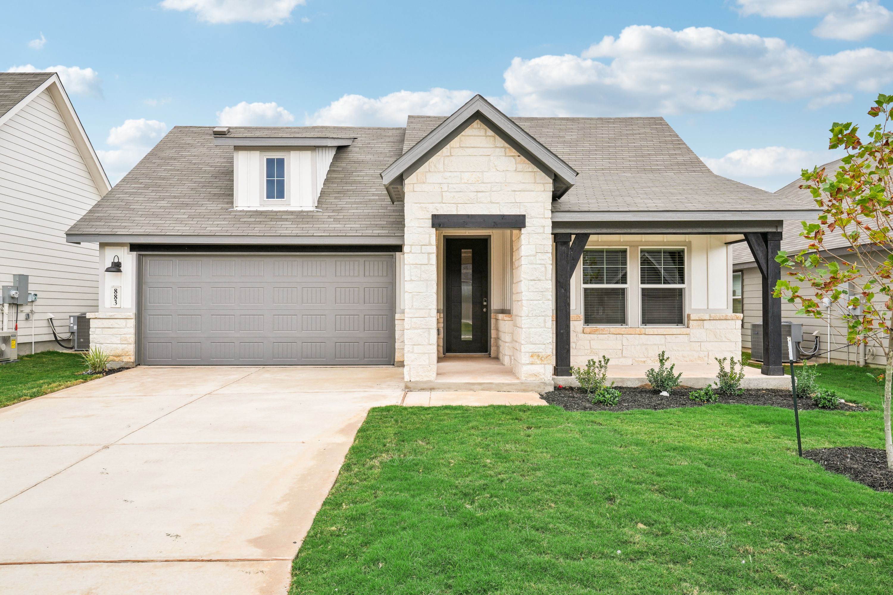 Front exterior of the Oleander floorplan at a Meritage Homes community.