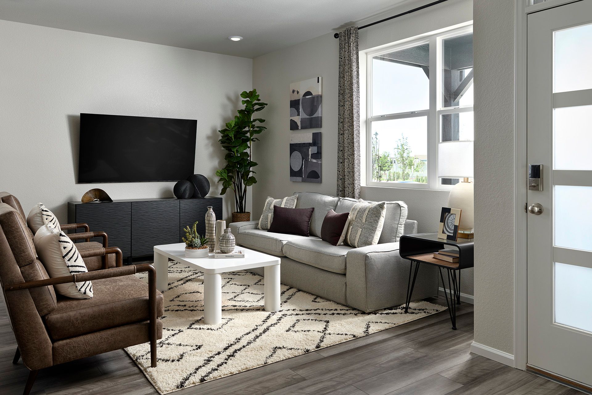 Welcome to the Woodland floorplan modeled ay Horizon Uptown in Aurora, CO.