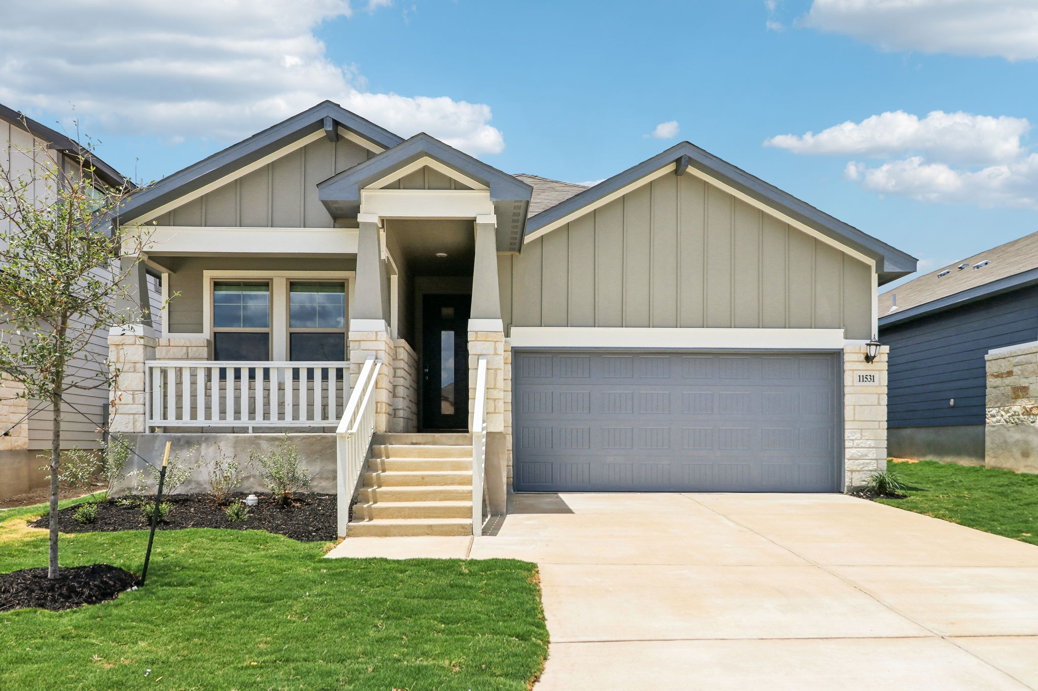 Front exterior of the Hughes floorplan at a Meritage Homes community.