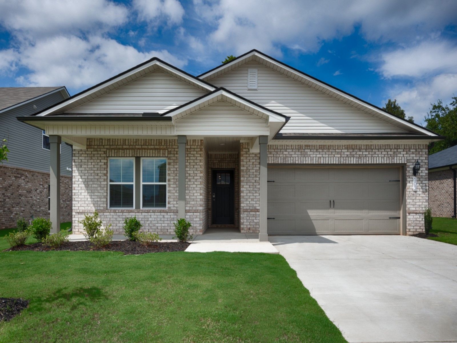 The Chandler floorplan with Elevation W modeled at Kendall Farms.
