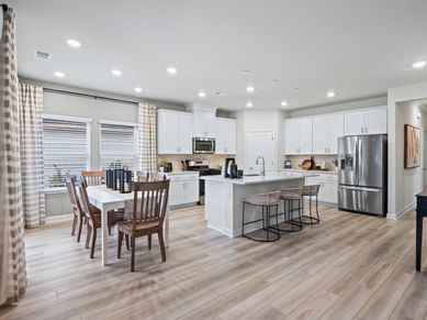 Enjoy your favorite home-cooked meal in the well-appointed kitchen and dining area.