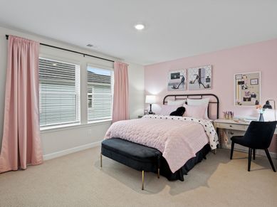 The second floor also offers an additional bedroom with a full bathroom.