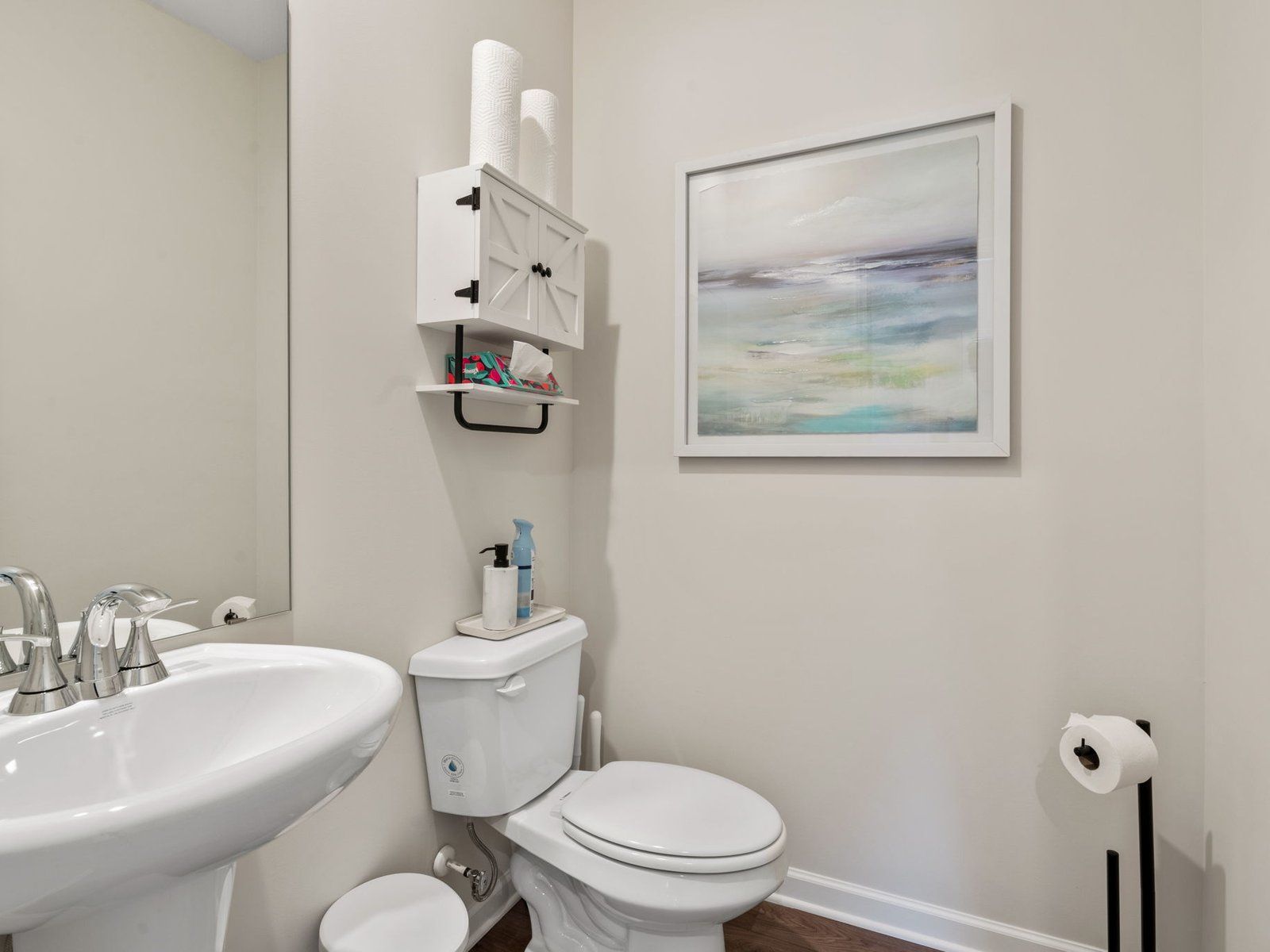 The half bathroom is conveniently located on the first floor.
