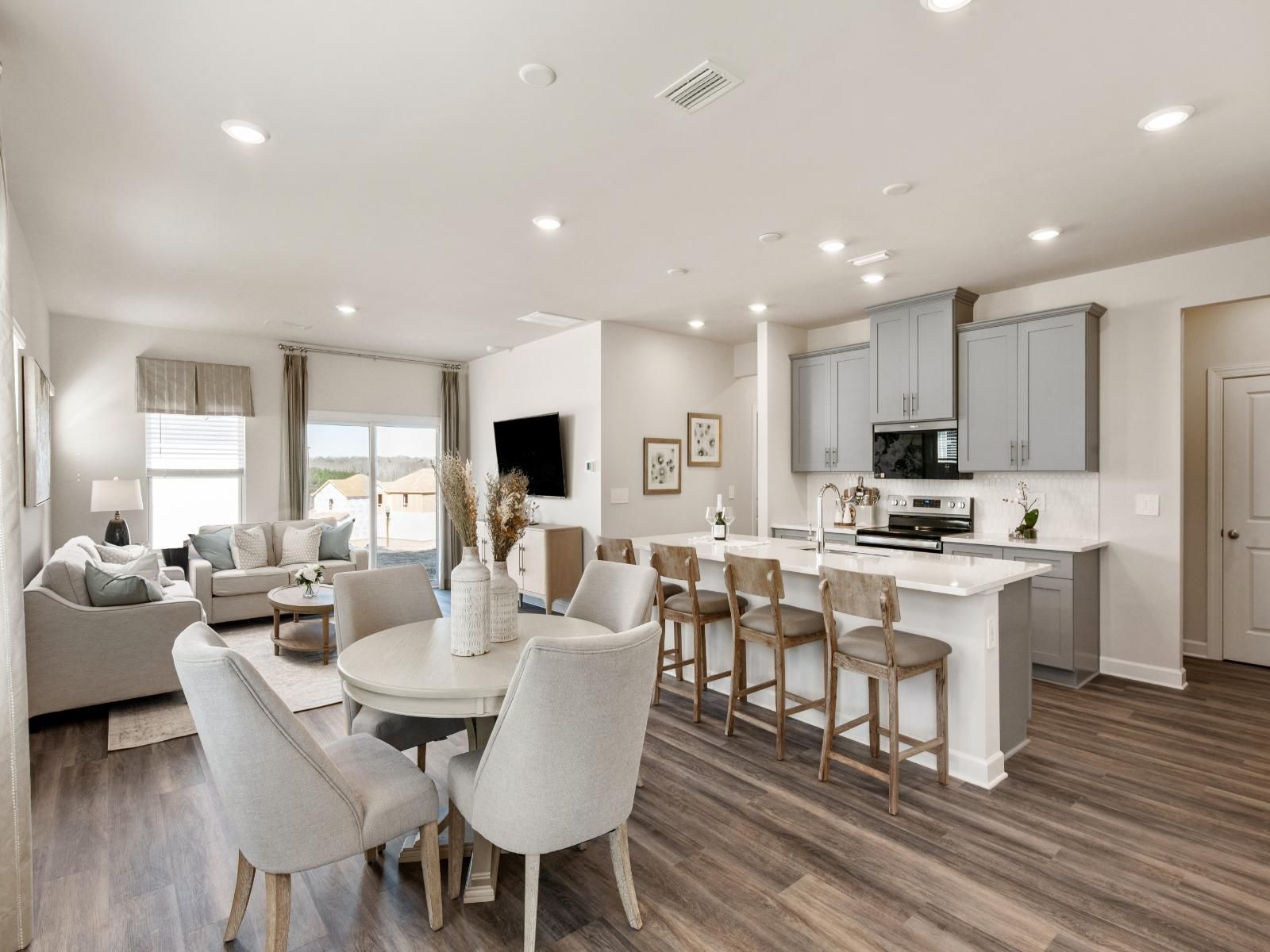 Step inside the Roswell&apos;s, bright open-concept living space.