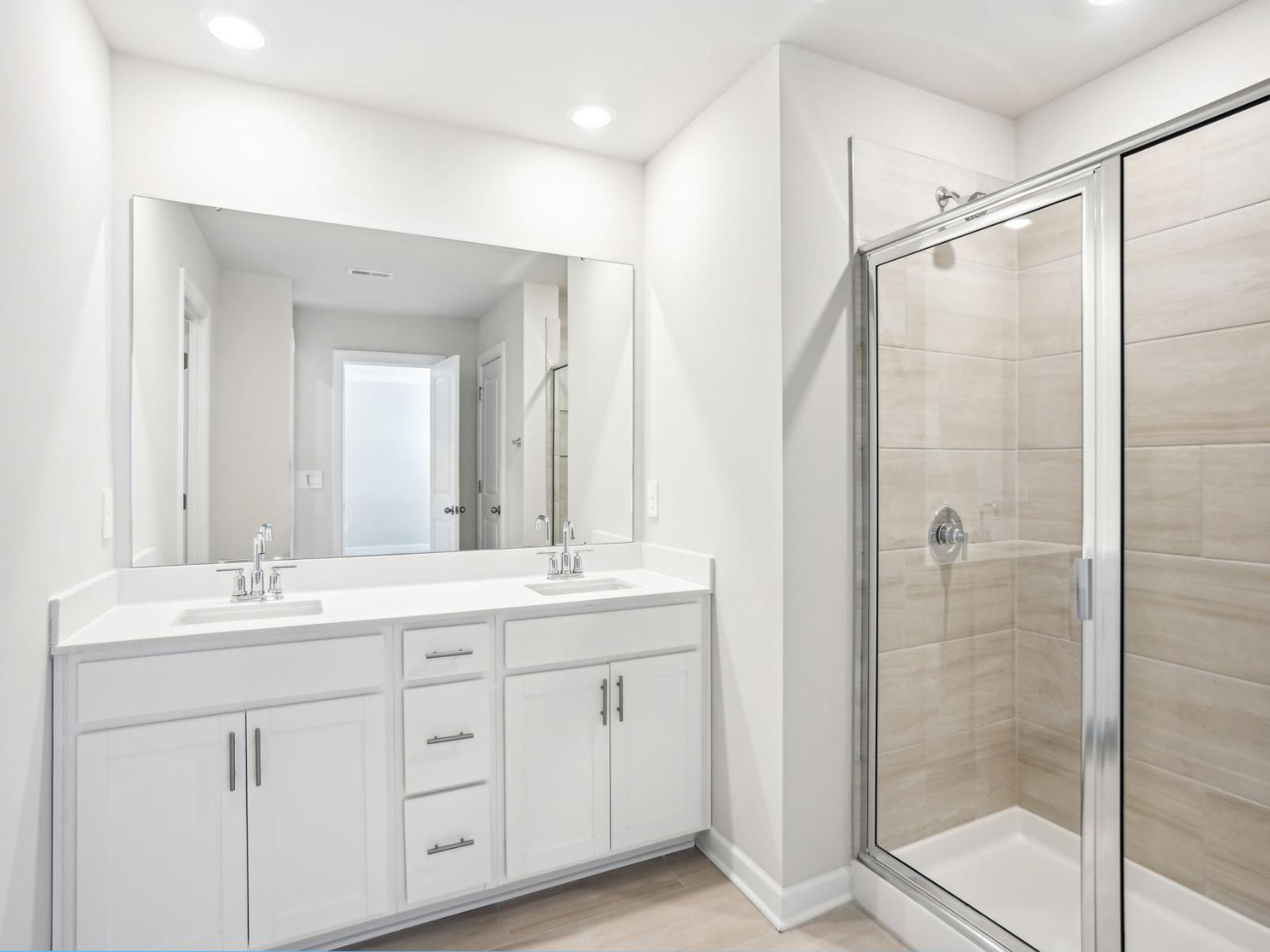 With plenty of cabinet storage, our primary bathroom will hold all your self-care essentials.
