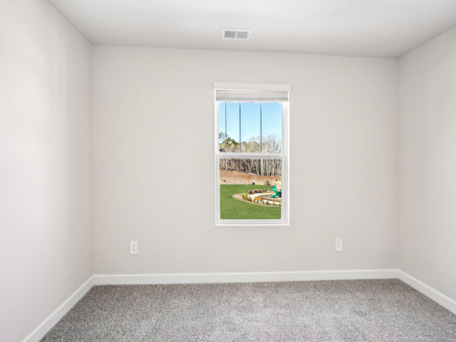 This secondary bedroom is the perfect space for guests.