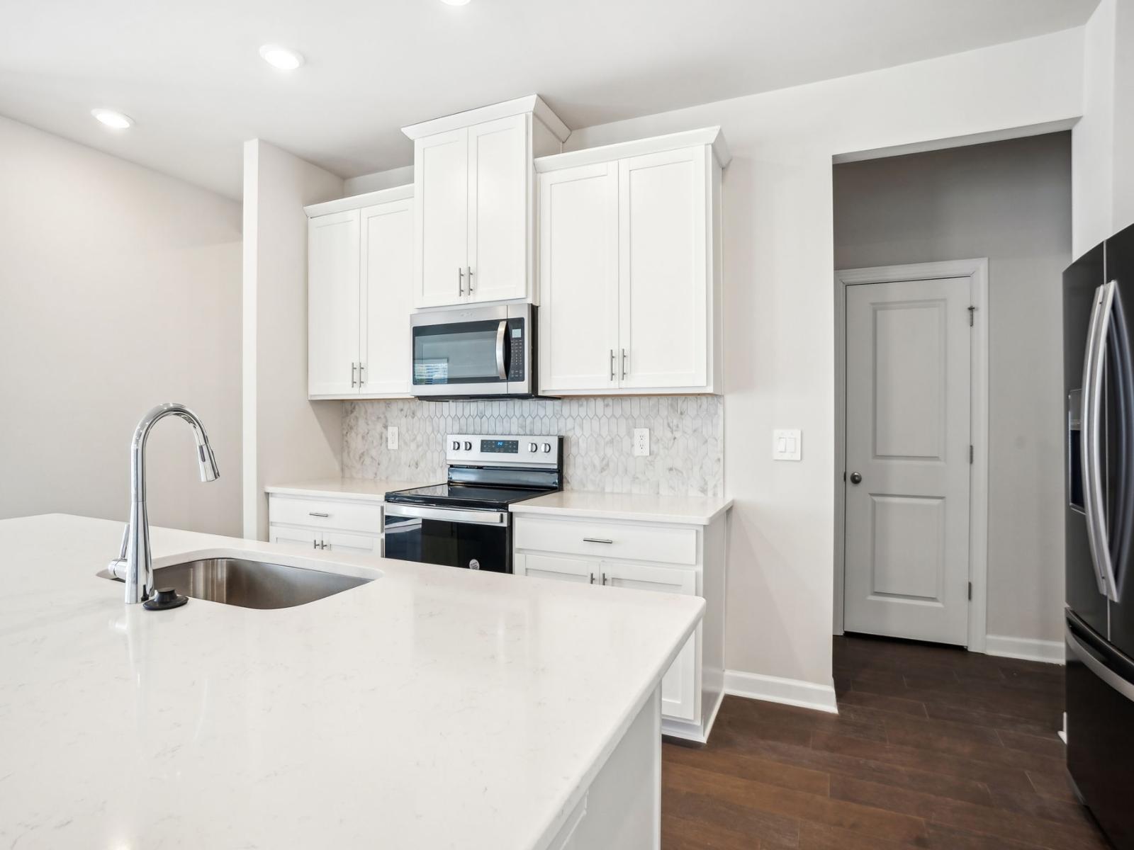 Cook or bake your favorite meal in this spacious, modern kitchen.