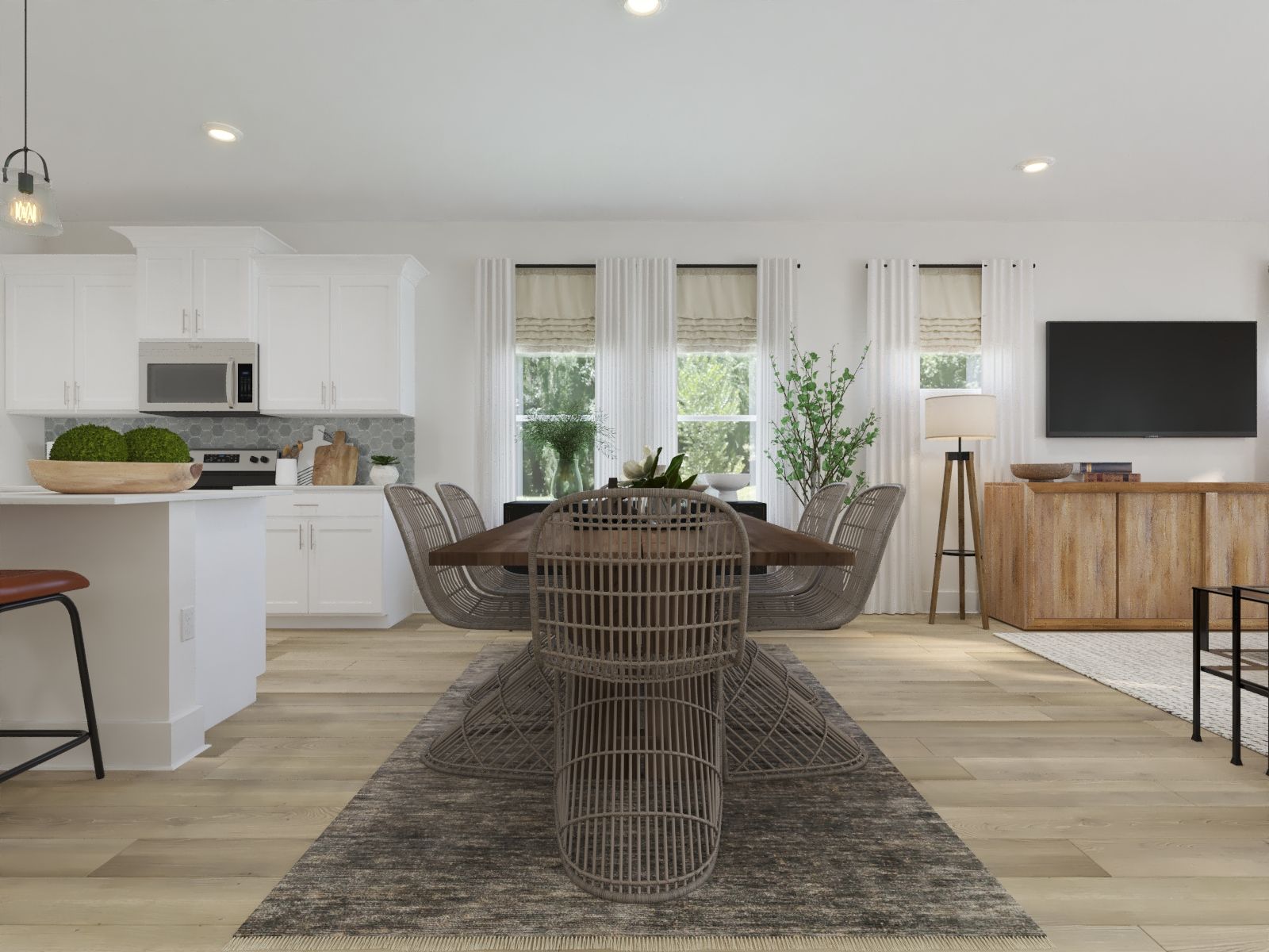The open-concept floorplan allows for an easy flow between the kitchen and dining areas.