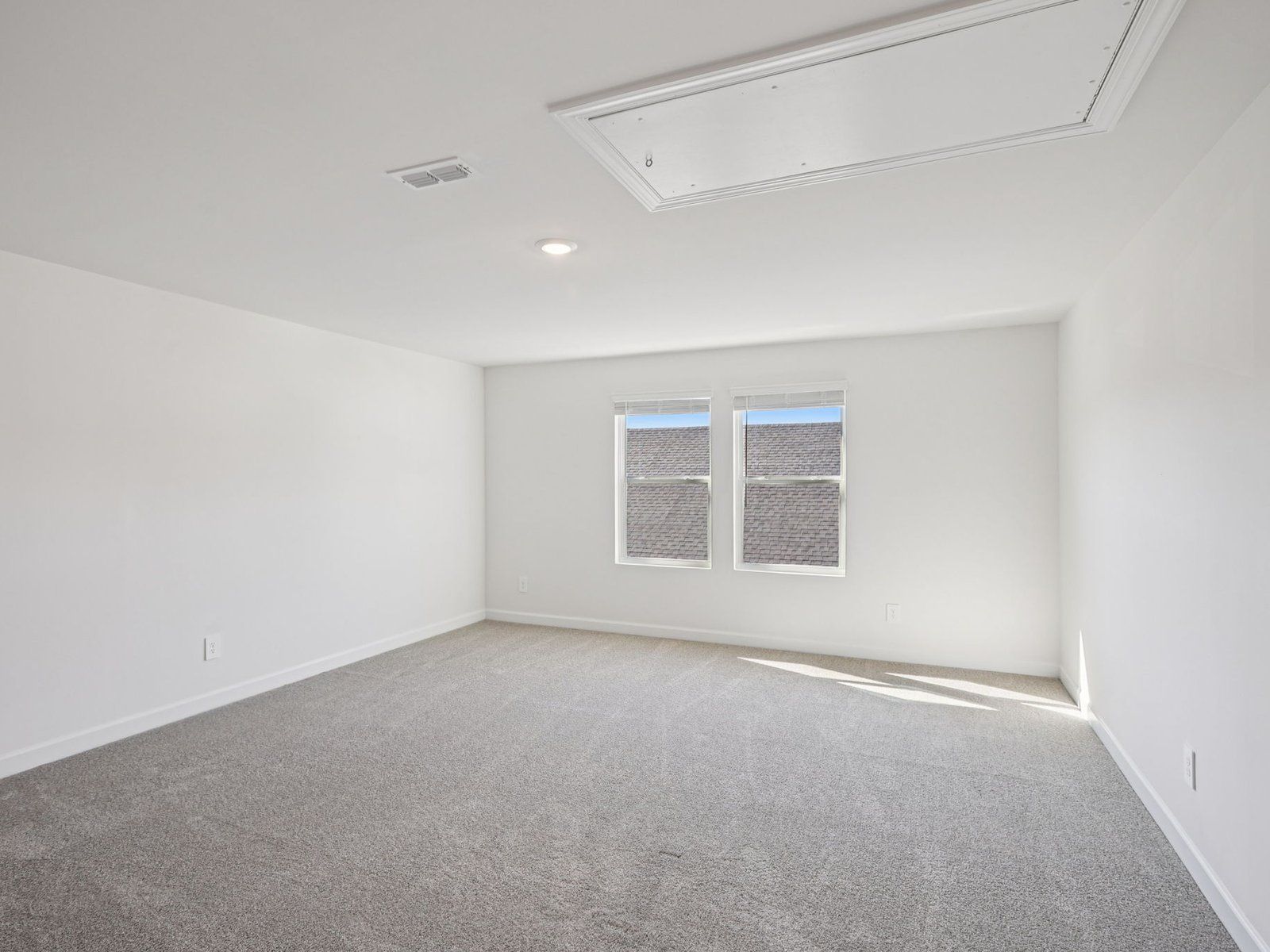Turn the loft into a comfortable upstairs lounge area.