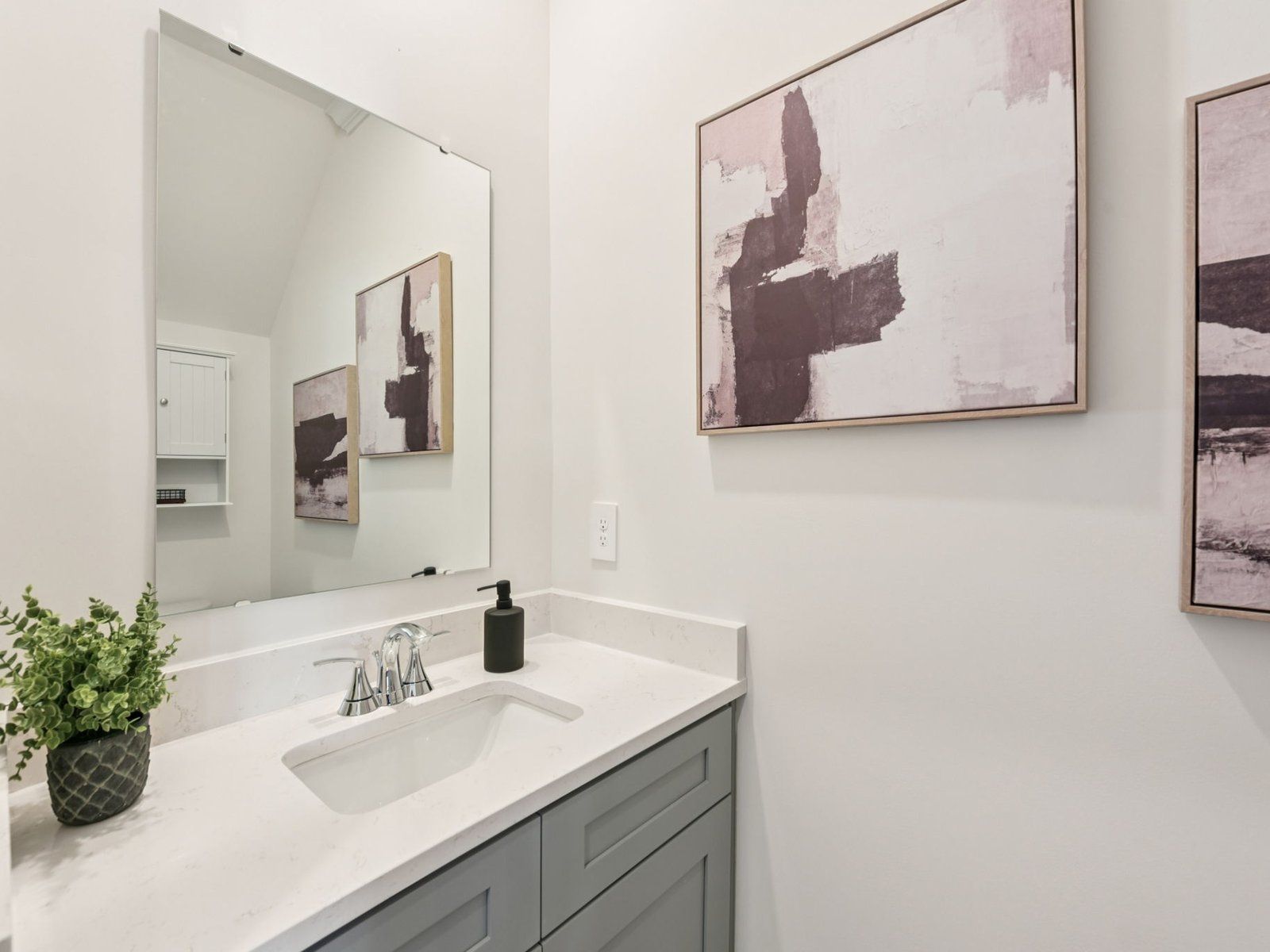 The half bathroom is conveniently located on the first floor for guests.